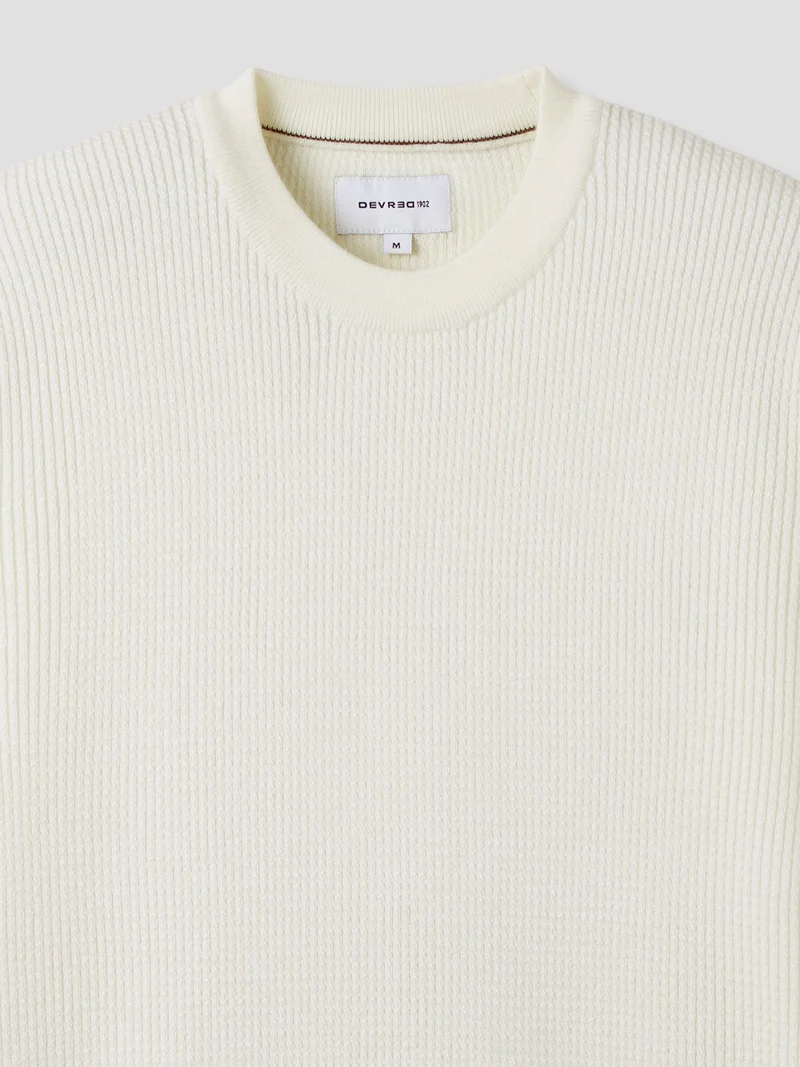 Pull col rond en maille torsadée