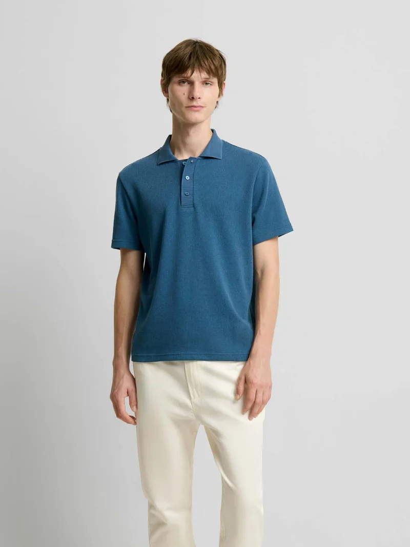 Polo regular col boutonné