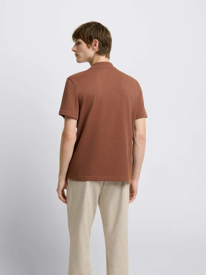 Polo regular col boutonné