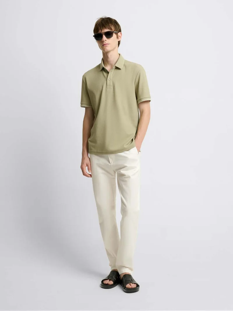 Polo col boutonné gauffré