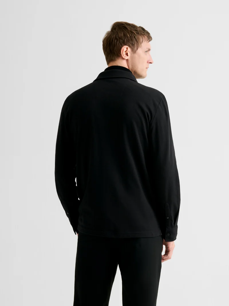 Polo boutonné en jacquard