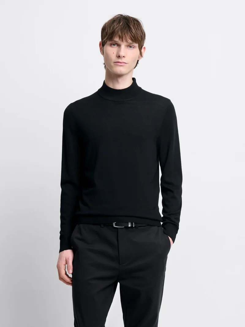 Pull col cheminée en laine Mérinos