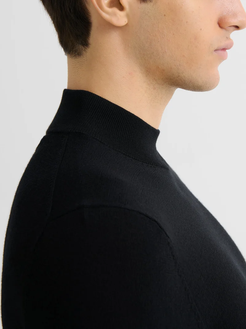 Pull col cheminée en laine Mérinos