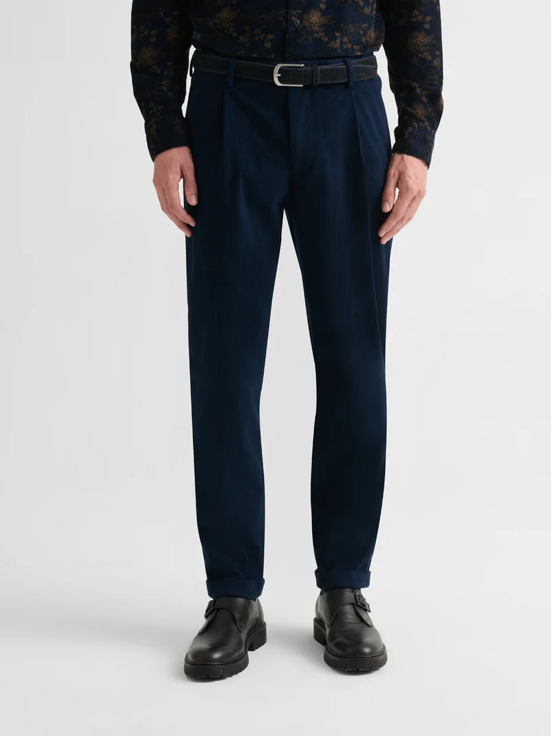 Pantalon à pinces en velours côtelé