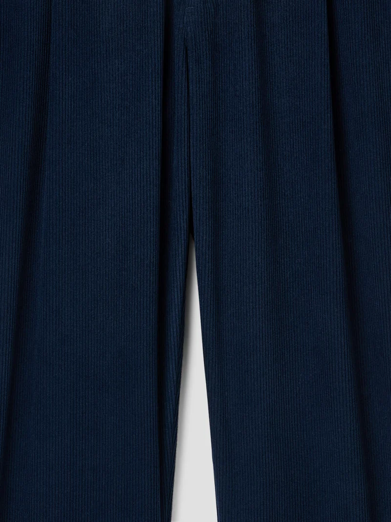 Pantalon à pinces en velours côtelé