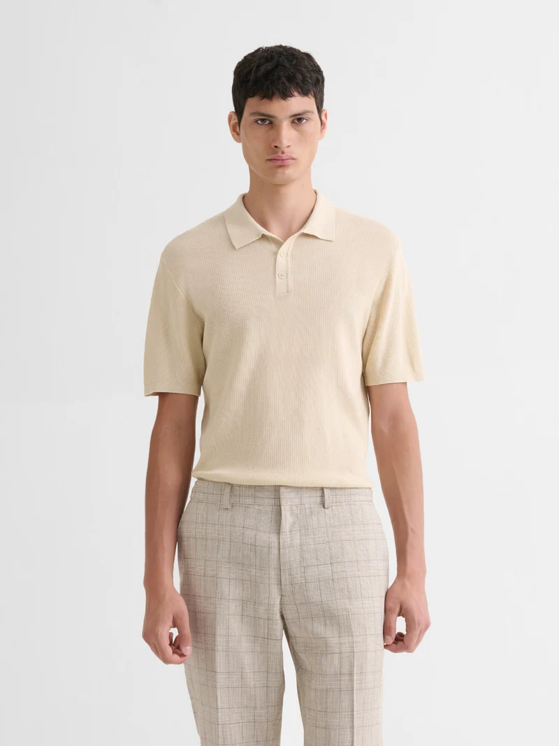 Polo col boutonné jeux de points