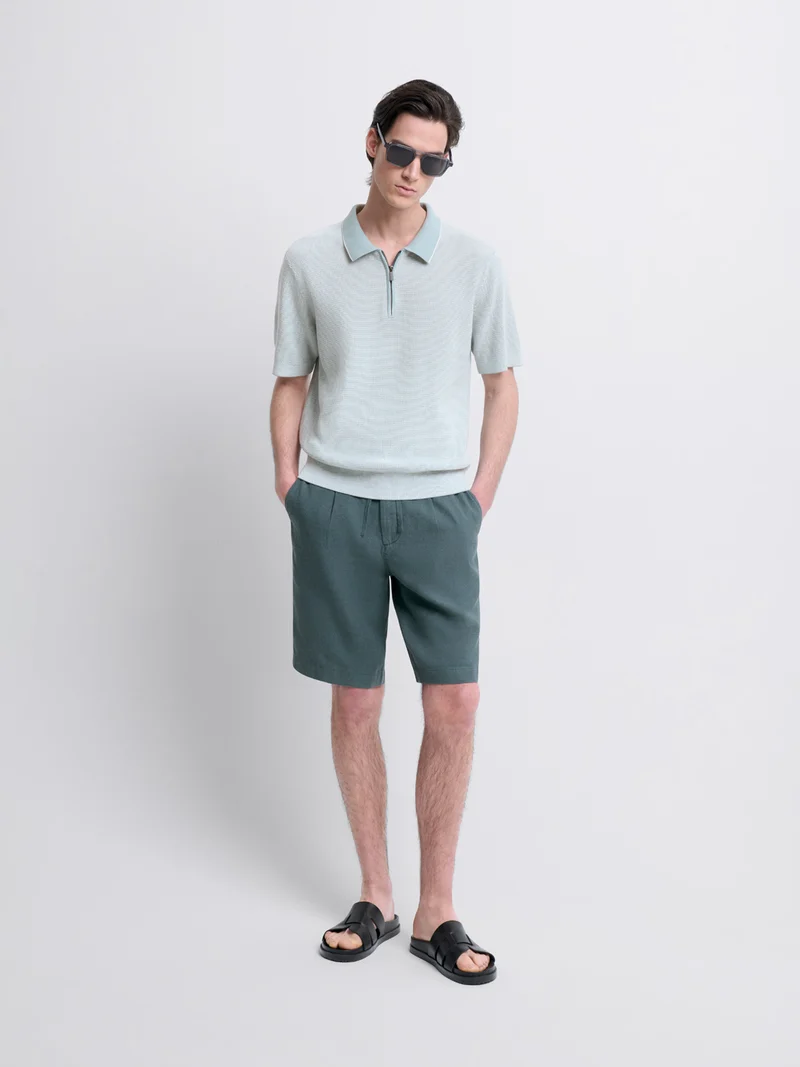 Polo col zippé en coton bio