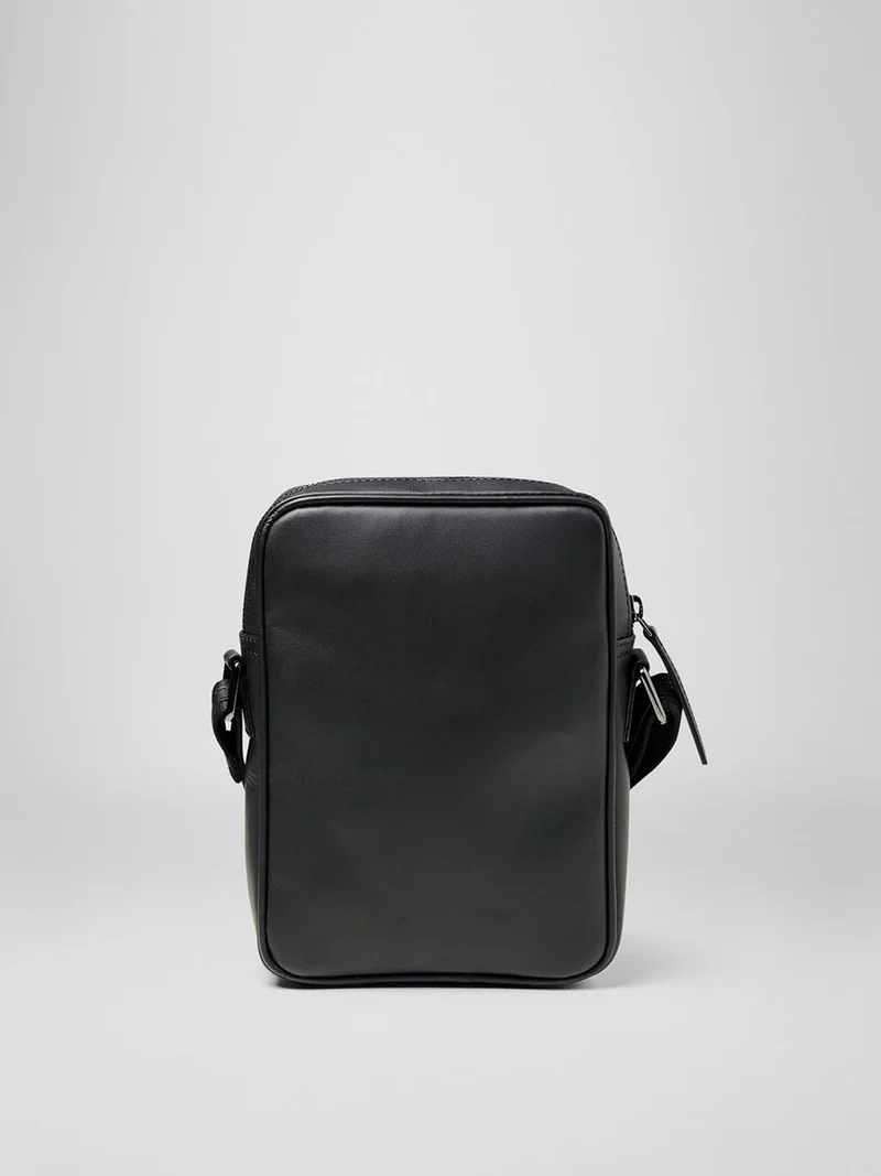 Petit sac bandoulière en cuir uni