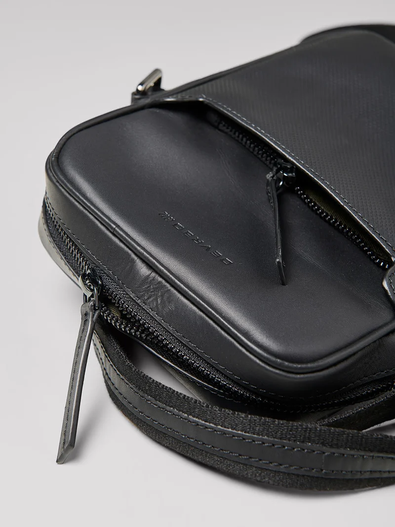 Petit sac bandoulière en cuir uni