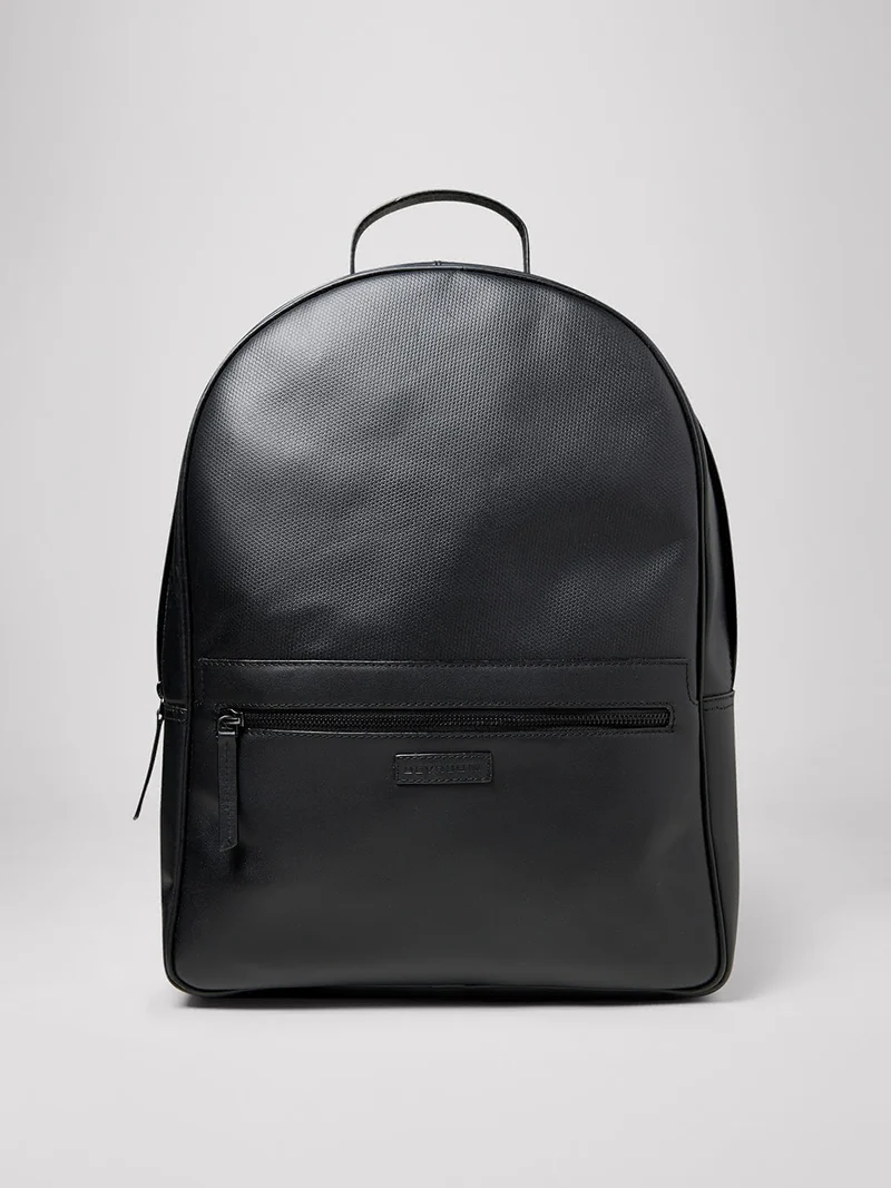Sac à dos en cuir uni