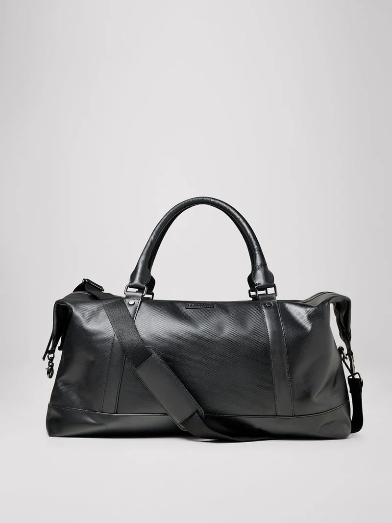 Sac de voyage en cuir uni