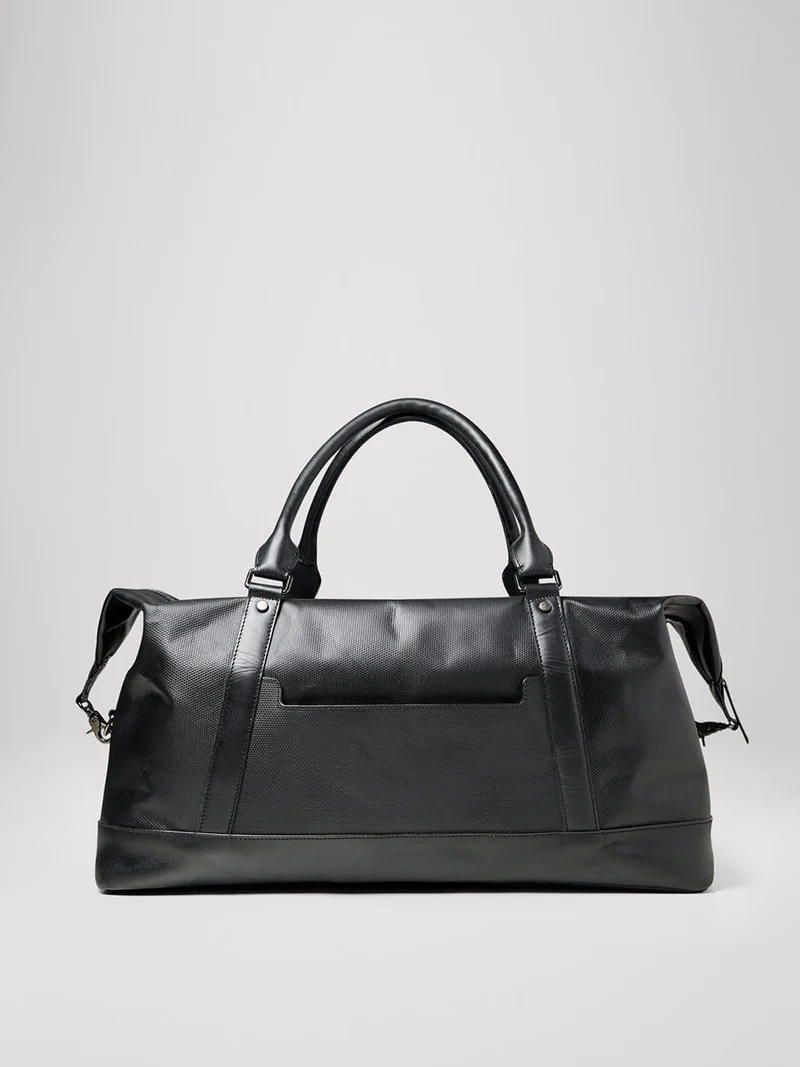 Sac de voyage en cuir uni