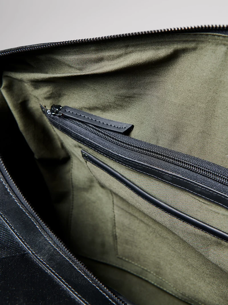 Sac de voyage en cuir uni