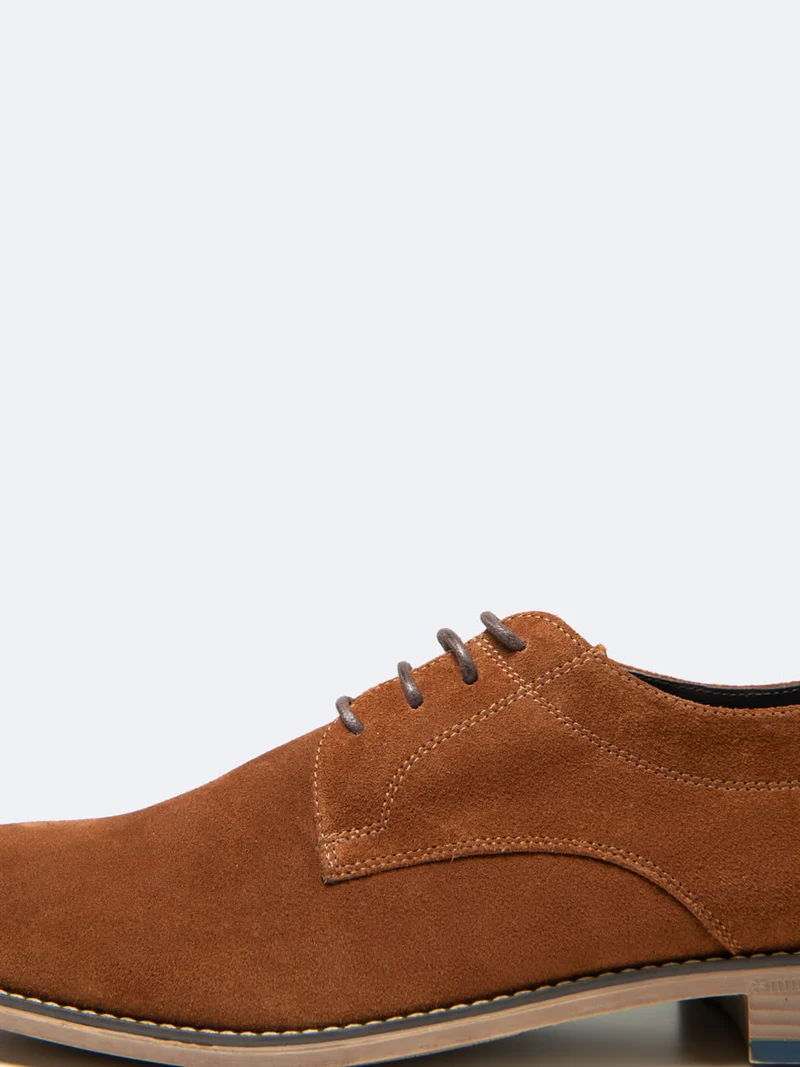Derbies en cuir suédé