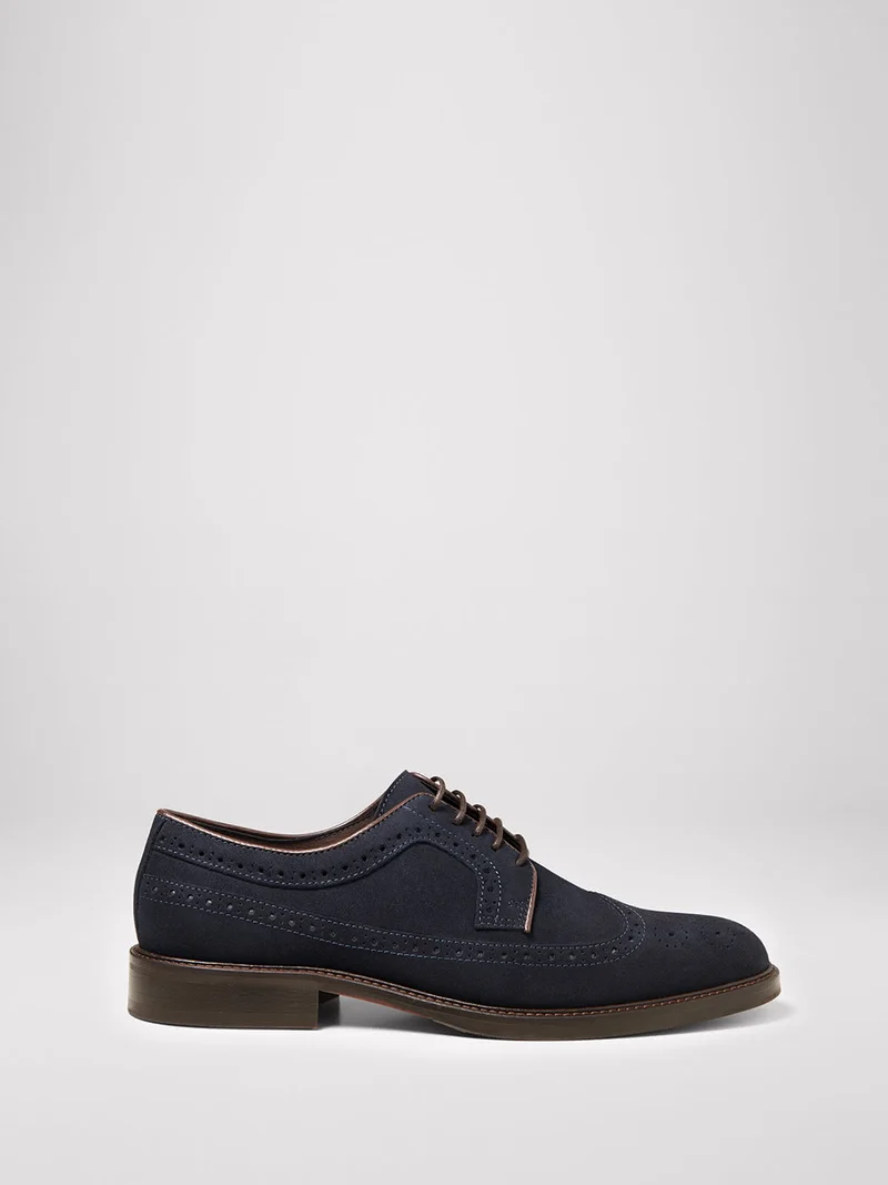 Derbies en cuir suédé
