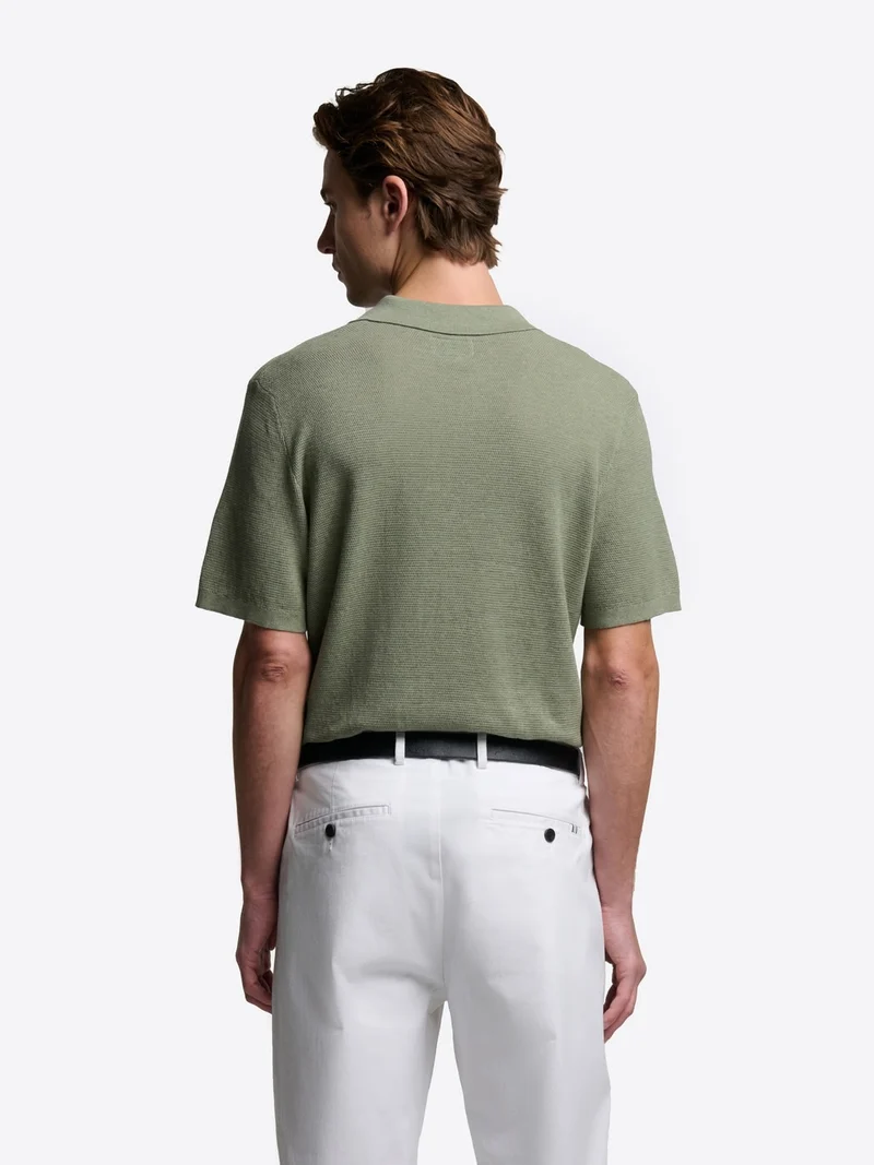 Polo maille col ouvert en coton bio