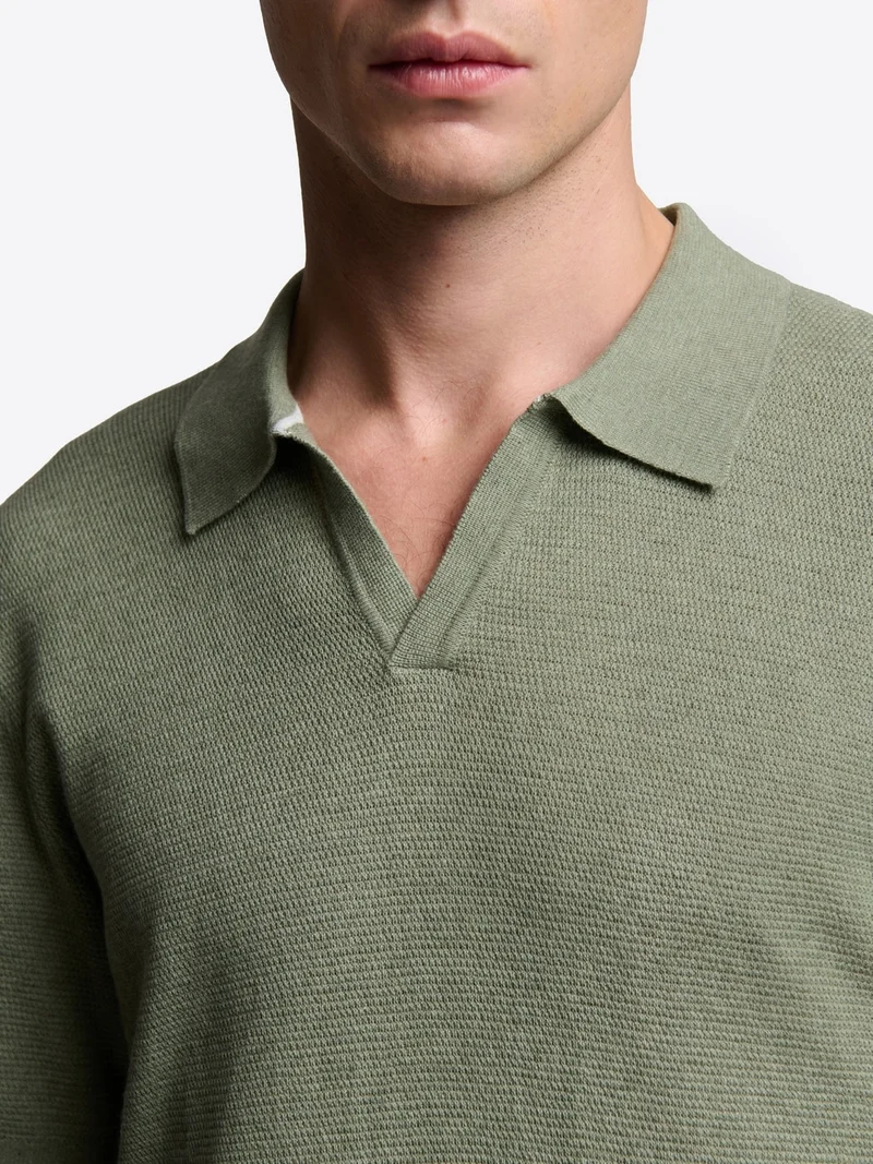 Polo maille col ouvert en coton bio