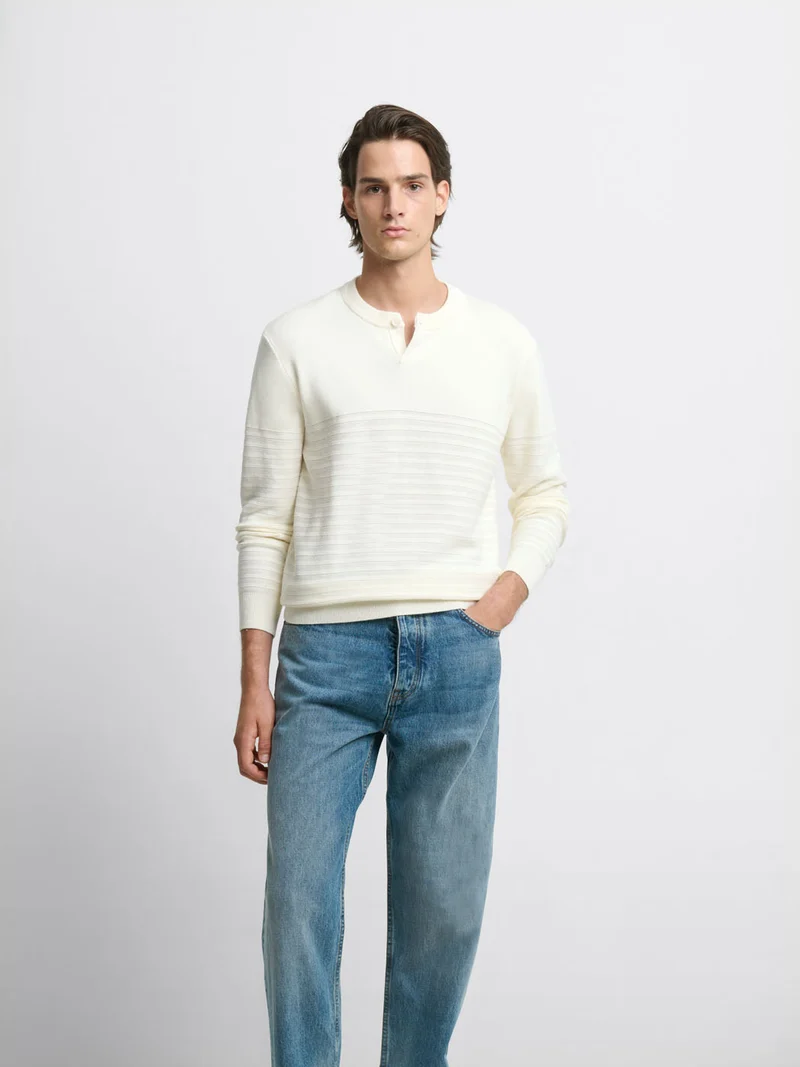 Pull col rond rayé