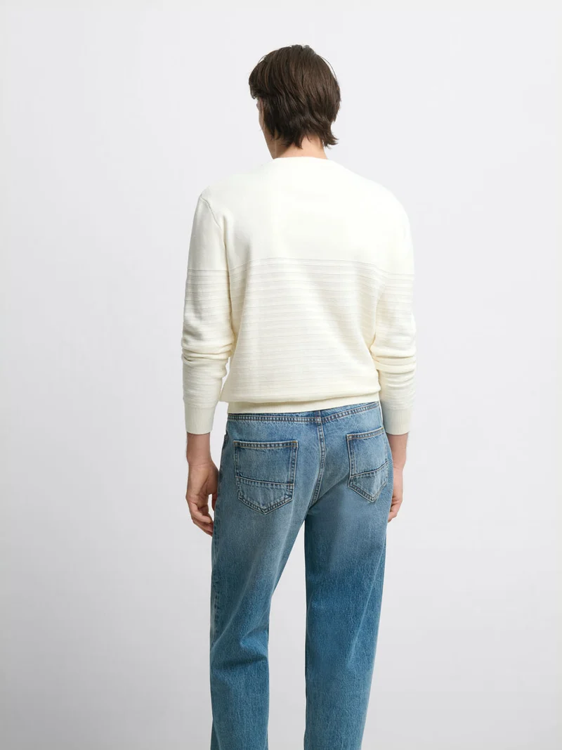 Pull col rond rayé