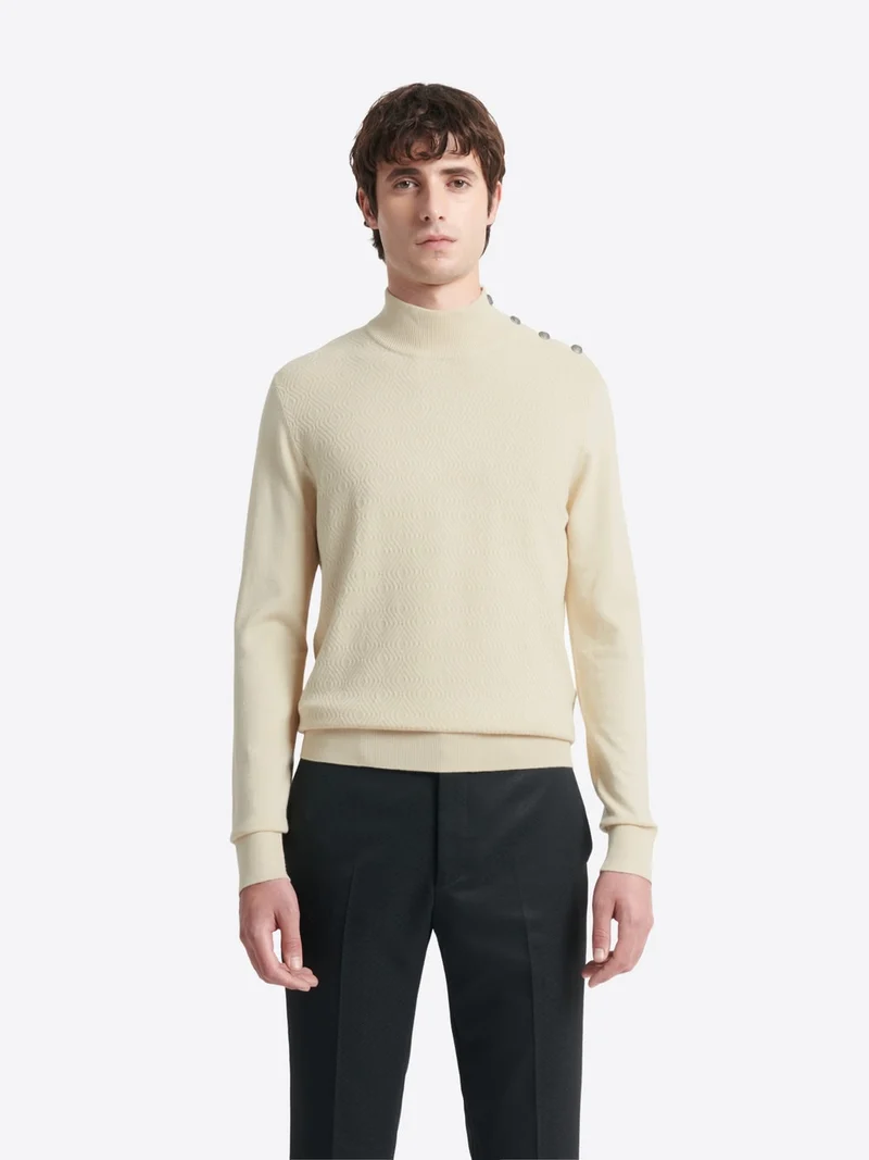 Pull col cheminée épaule boutonnée
