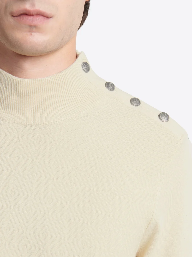 Pull col cheminée épaule boutonnée