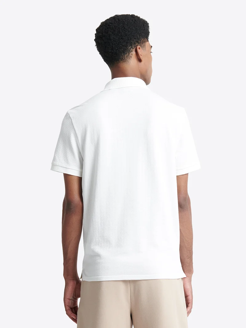 Polo manches courtes brodé en coton