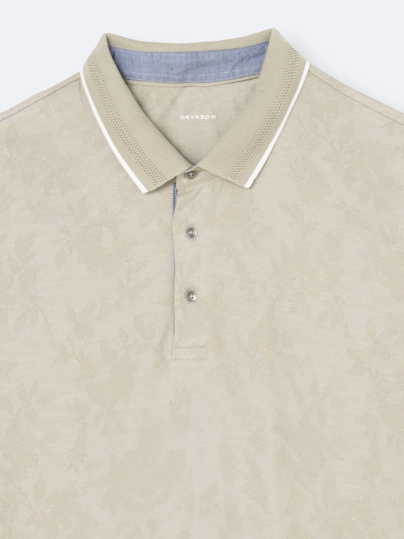 Polo manches courtes fleuri en coton