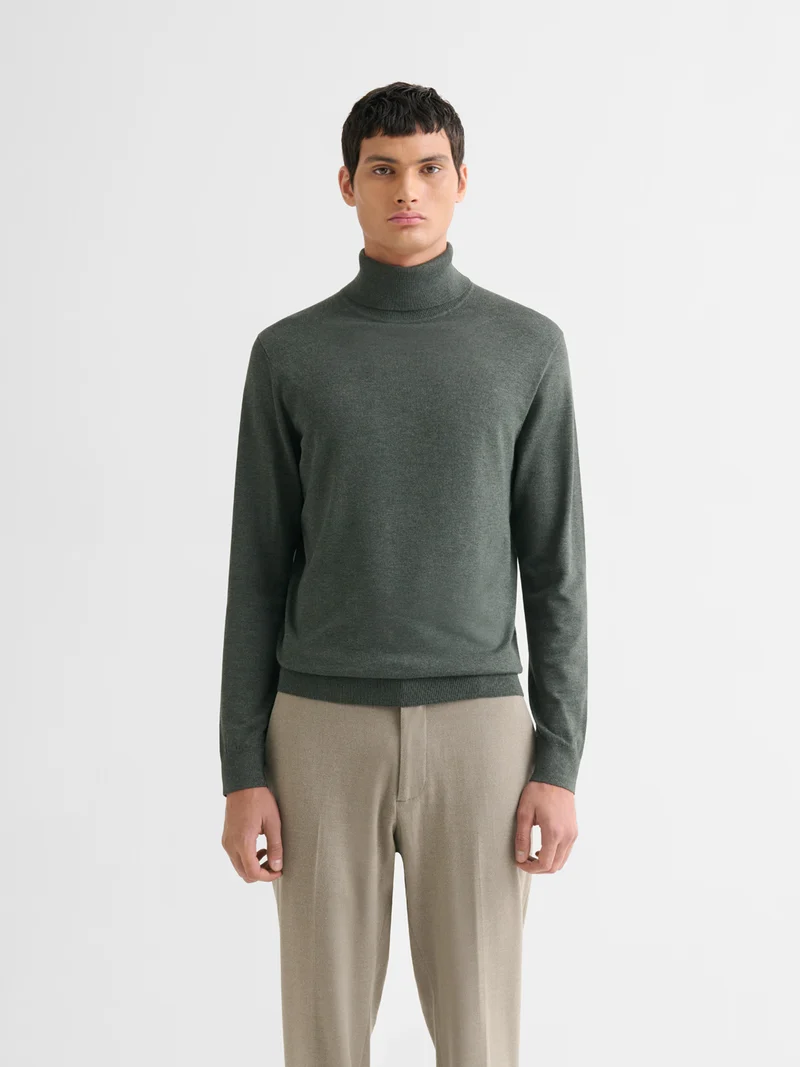 Pull col roulé en jersey