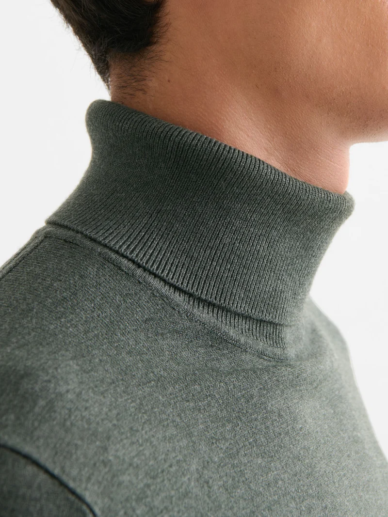 Pull col roulé en jersey