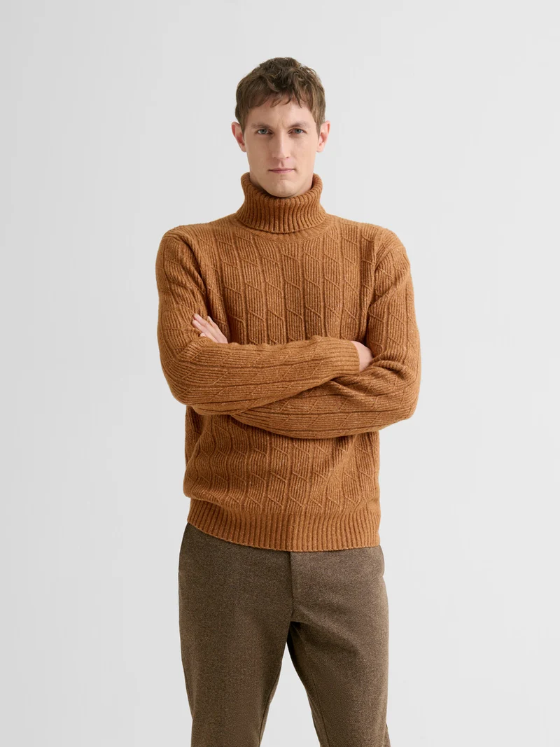 Pull col roulé chiné