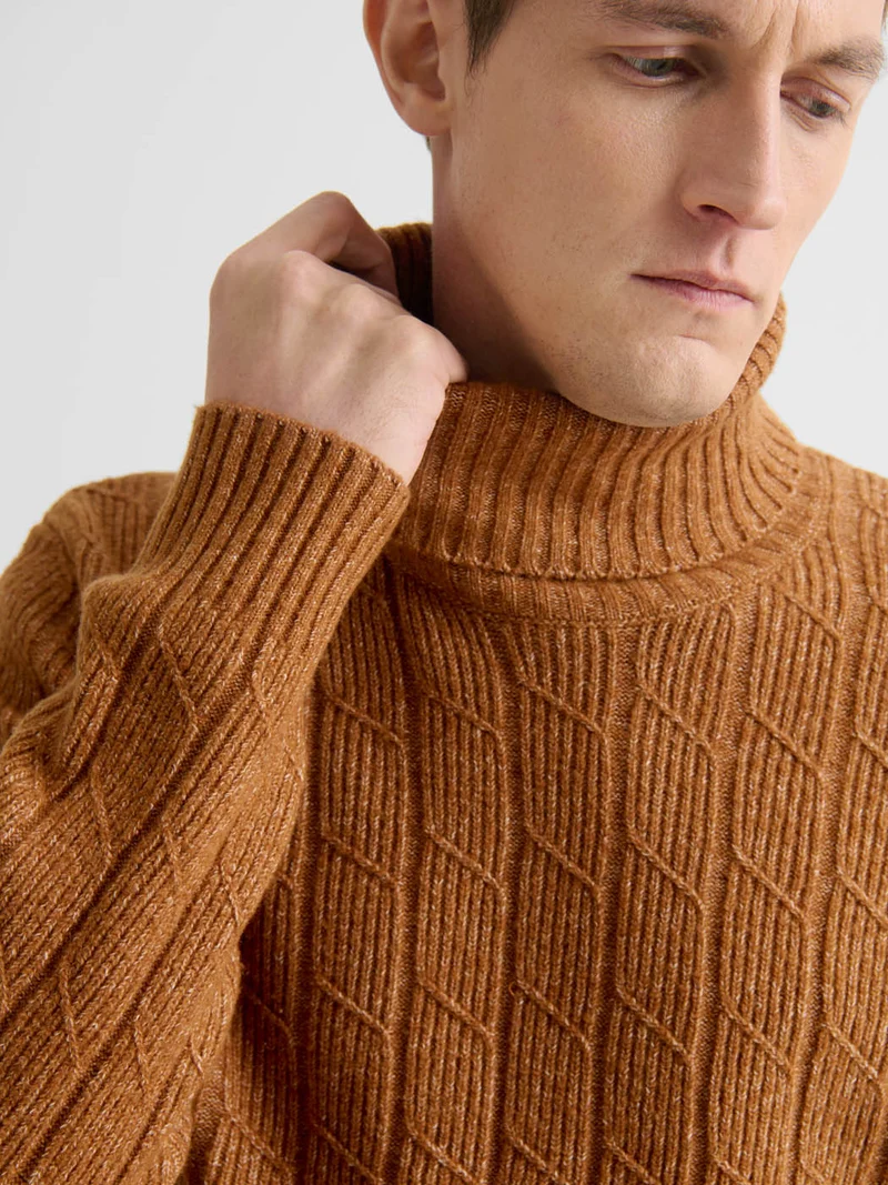 Pull col roulé chiné