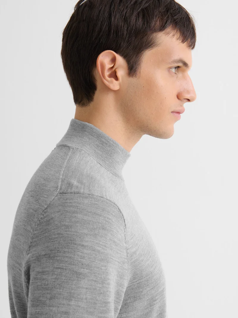 Pull col cheminée en laine Mérinos