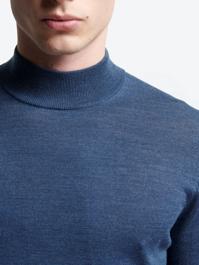 Pull col cheminée en laine Mérinos