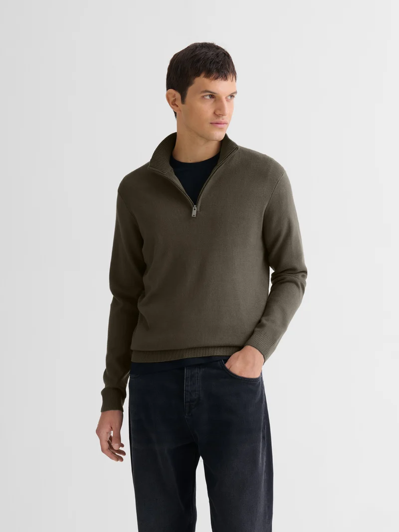 Pull col cheminée zippé