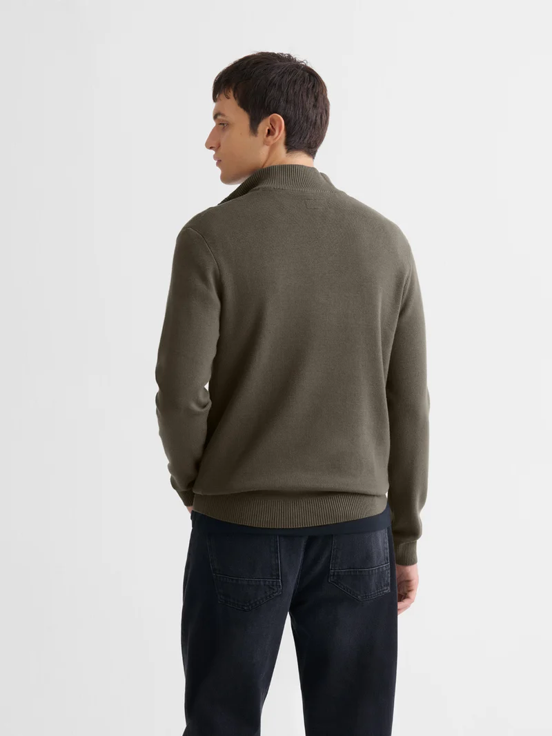 Pull col cheminée zippé