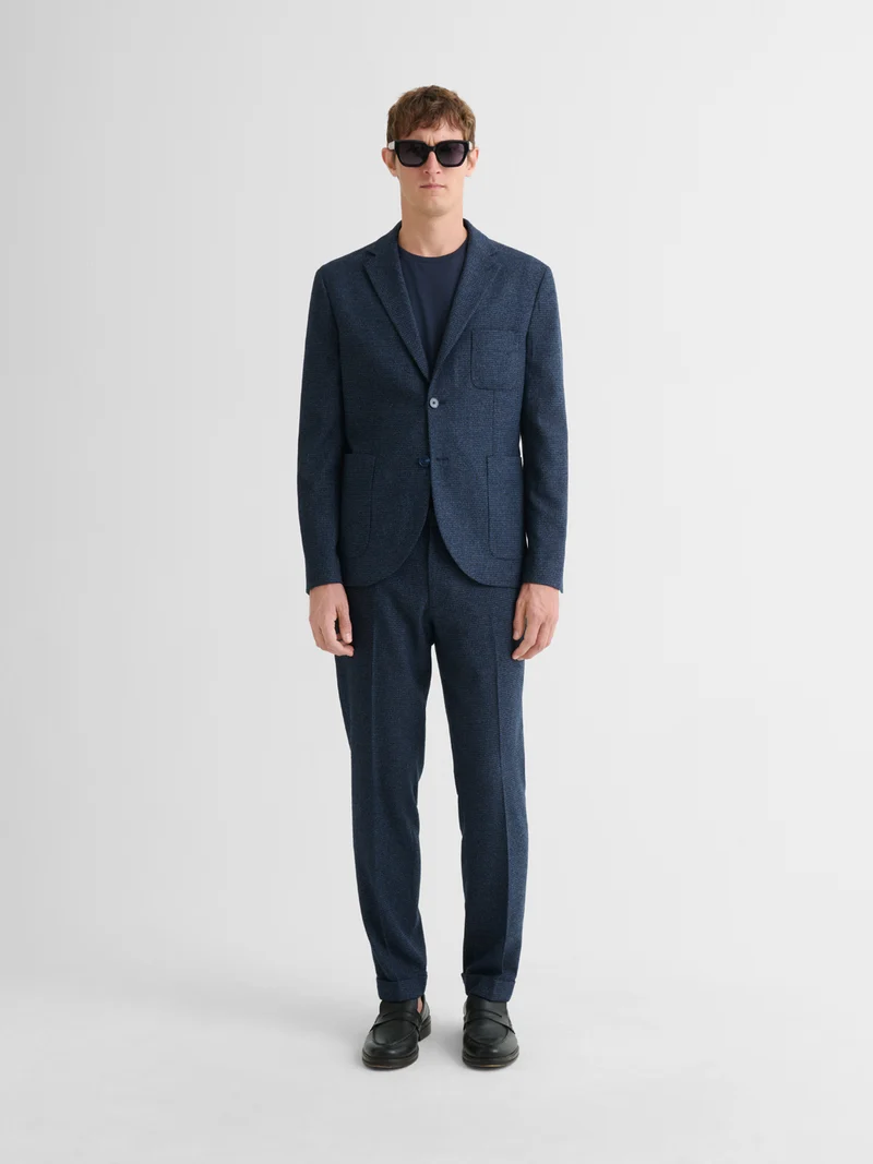 Pantalon de costume slim pied de puce