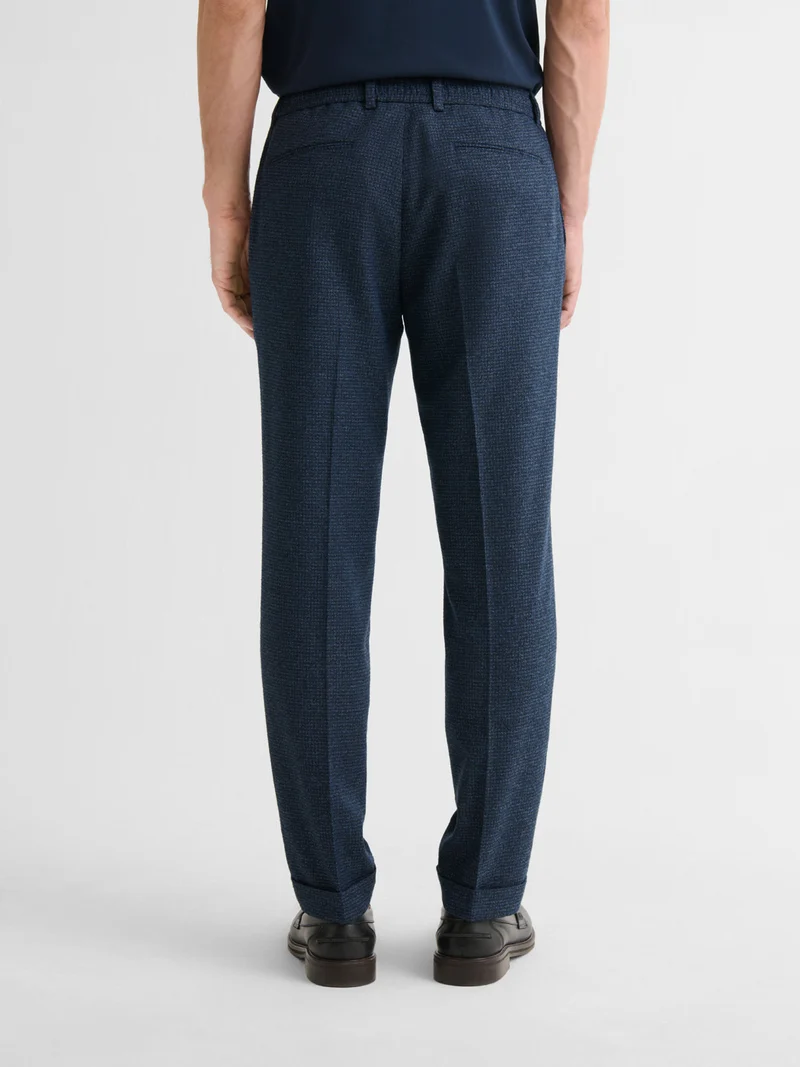 Pantalon de costume slim pied de puce