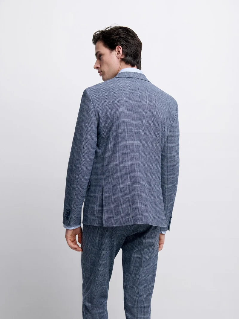 Costume 3 pièces slim bleu nuit à carreaux