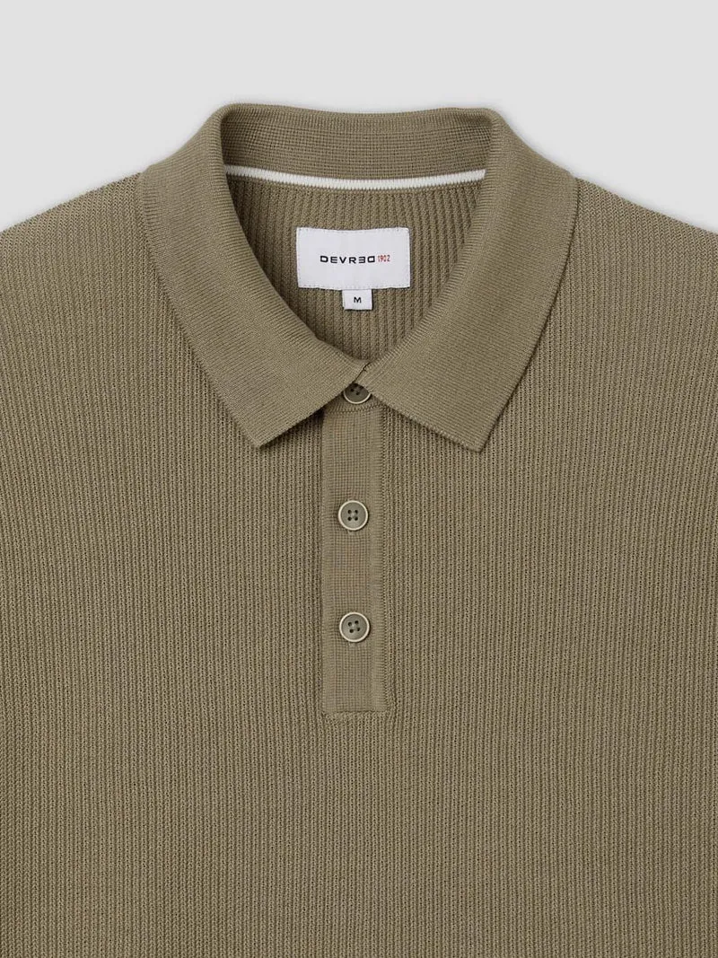 Polo col boutonné jeux de points