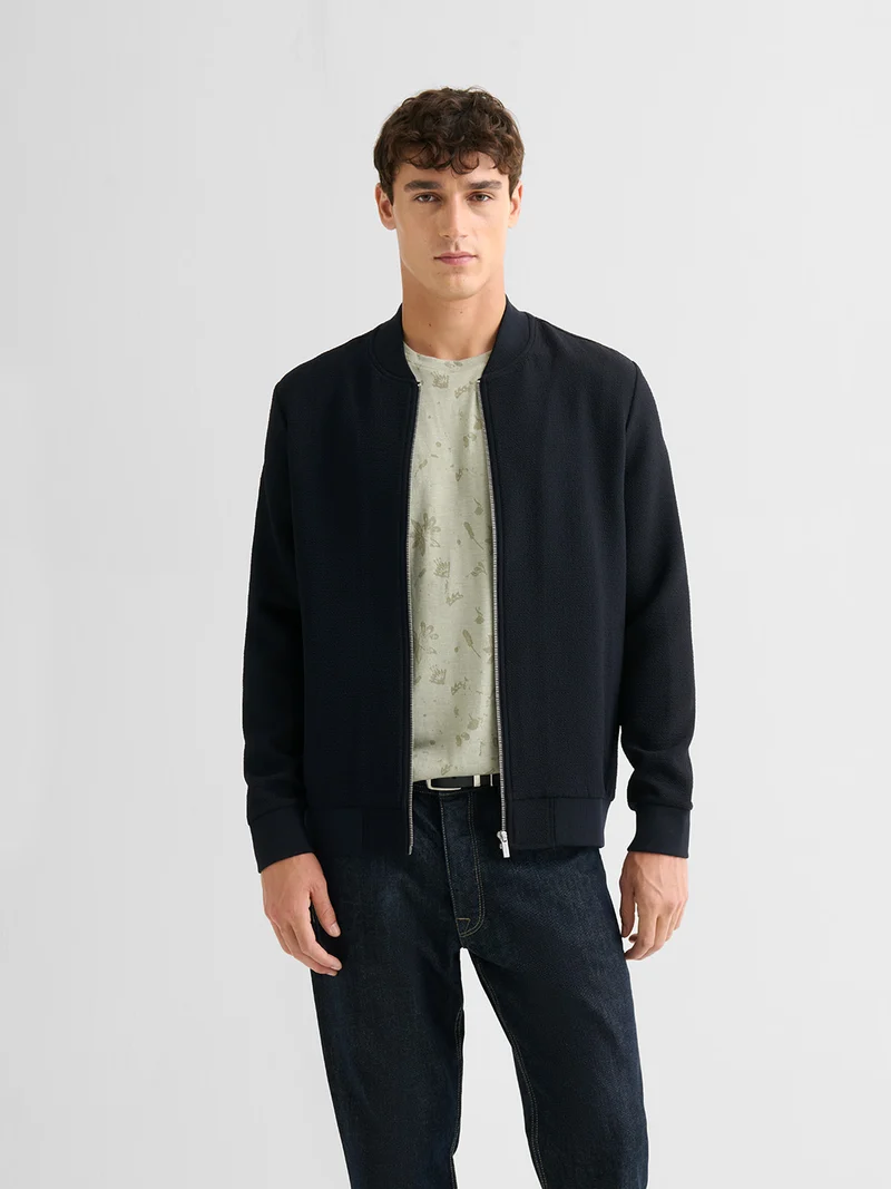 Veste légère col teddy texturé