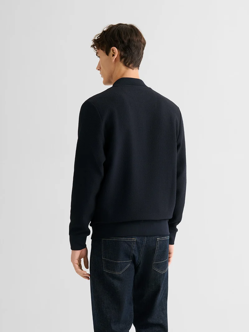 Veste légère col teddy texturé