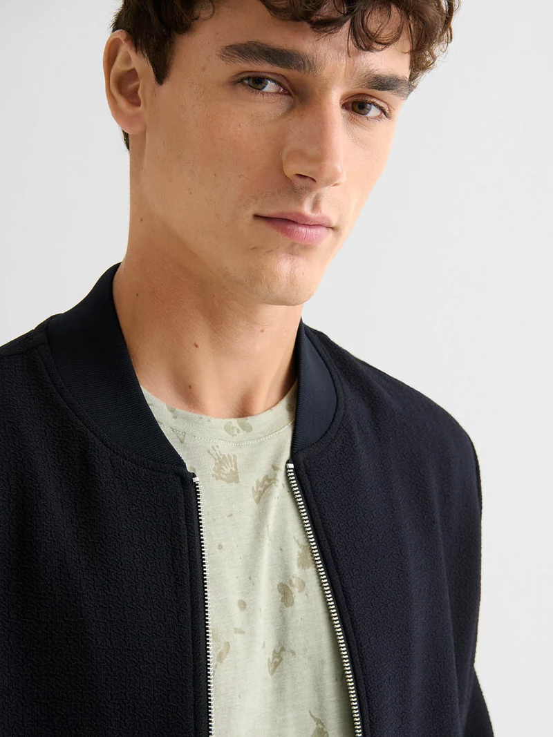 Veste légère col teddy texturé