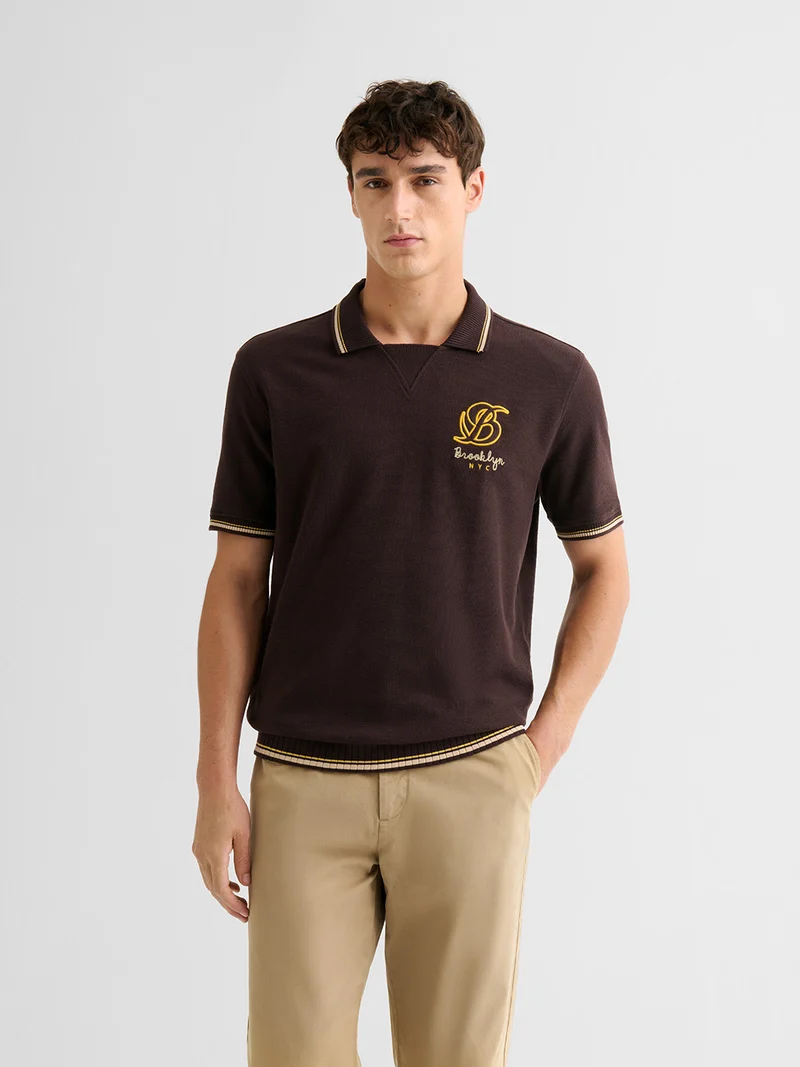 Polo boutonné en coton