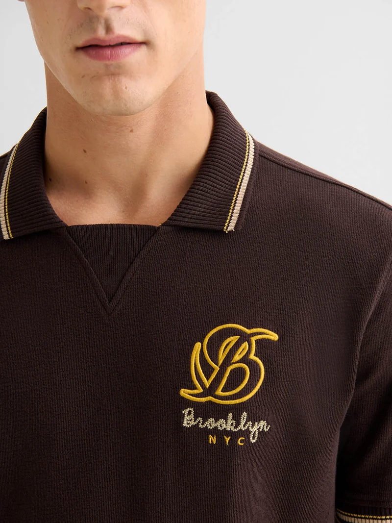 Polo boutonné en coton