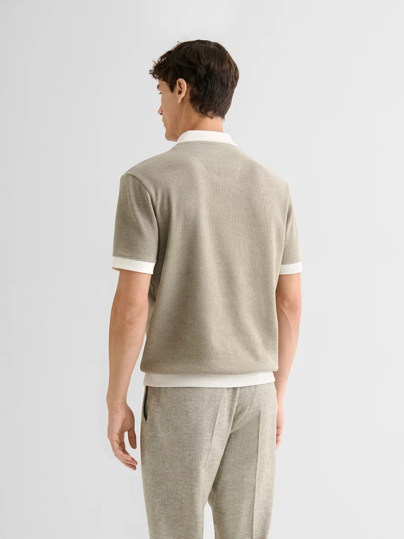 Polo col ouvert gauffré