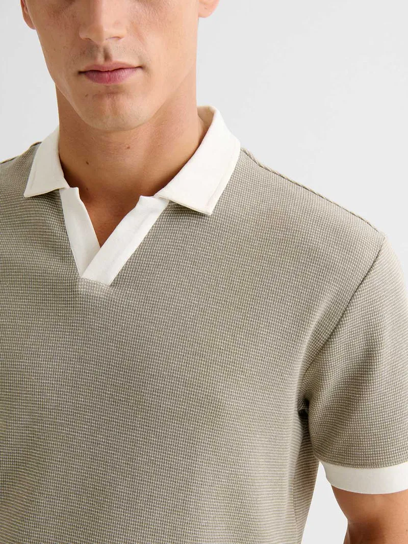 Polo col ouvert gauffré
