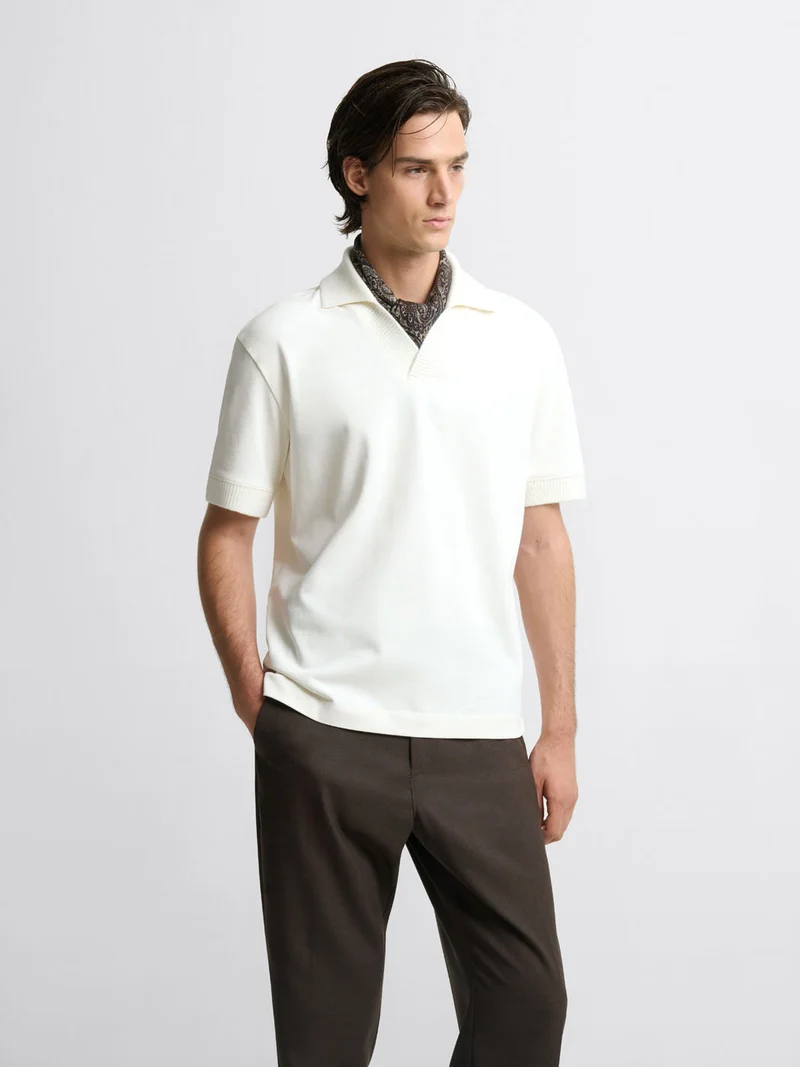 Polo col V - L'Atelier