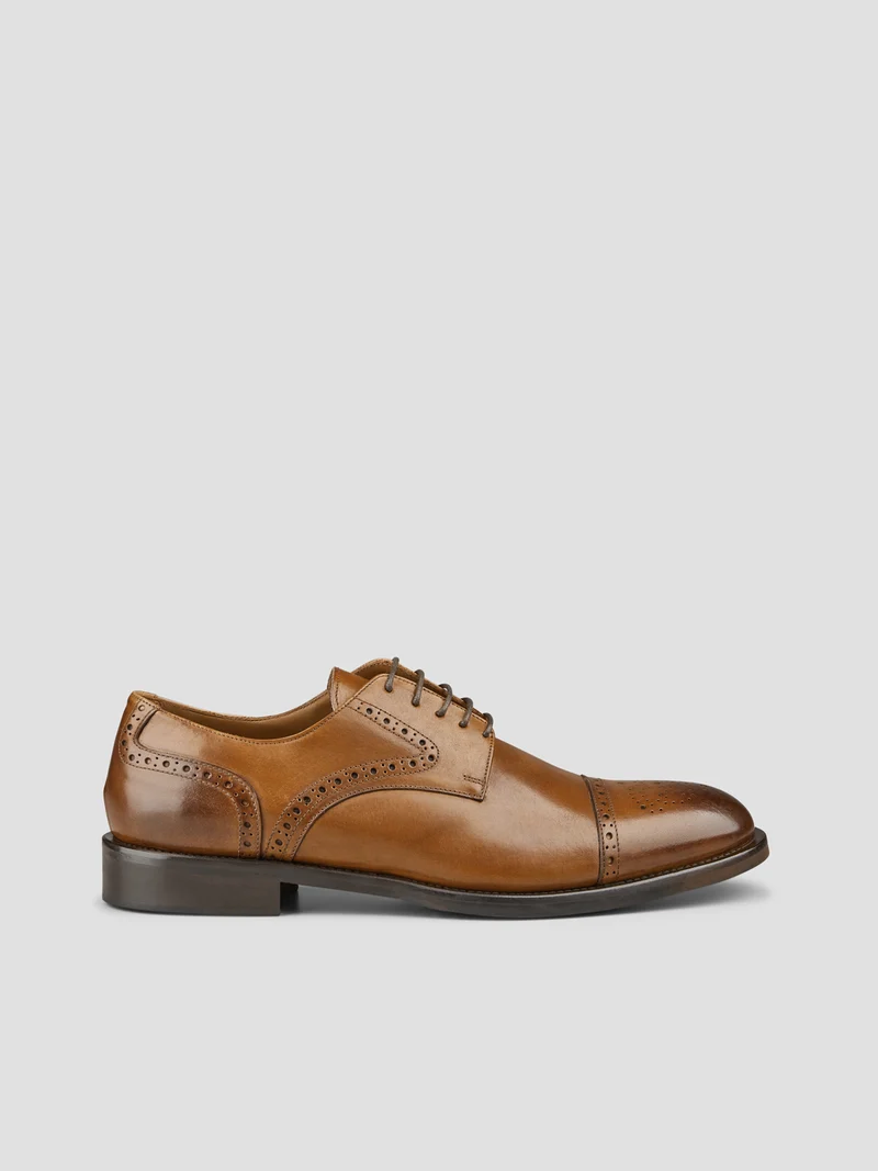 Derbies en cuir fleuri