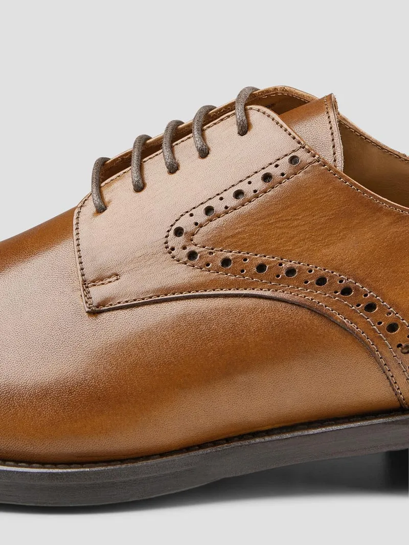 Derbies en cuir fleuri