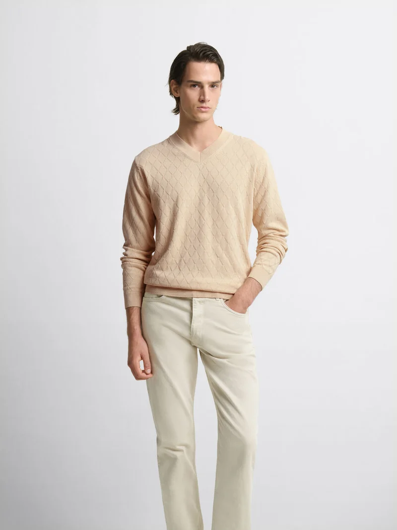 Pull col V tricotage fantaisie